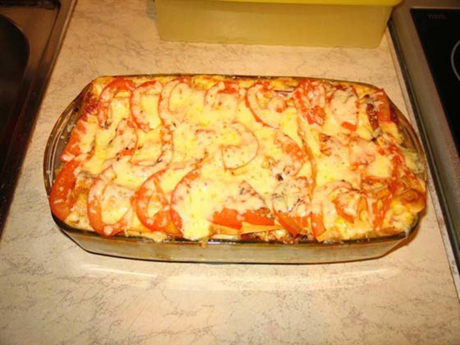 Картошка в духовке с сыром и помидорами